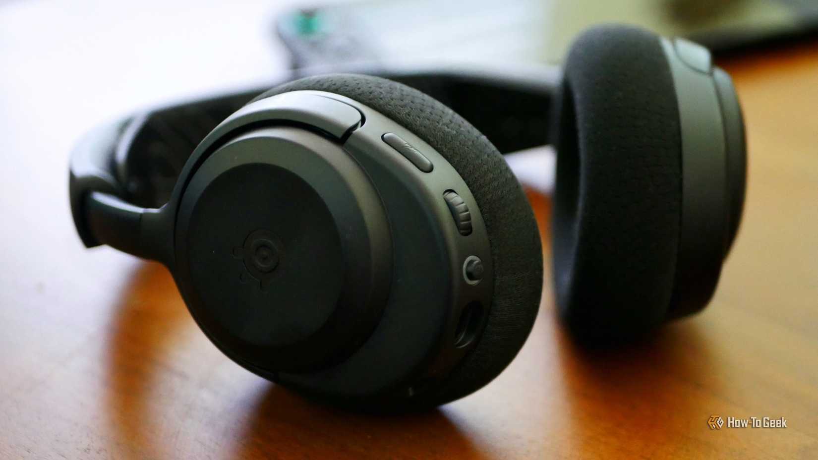 SteelSeries Arctis Nova 3X headphones with a Nintendo Switch 2 in the background