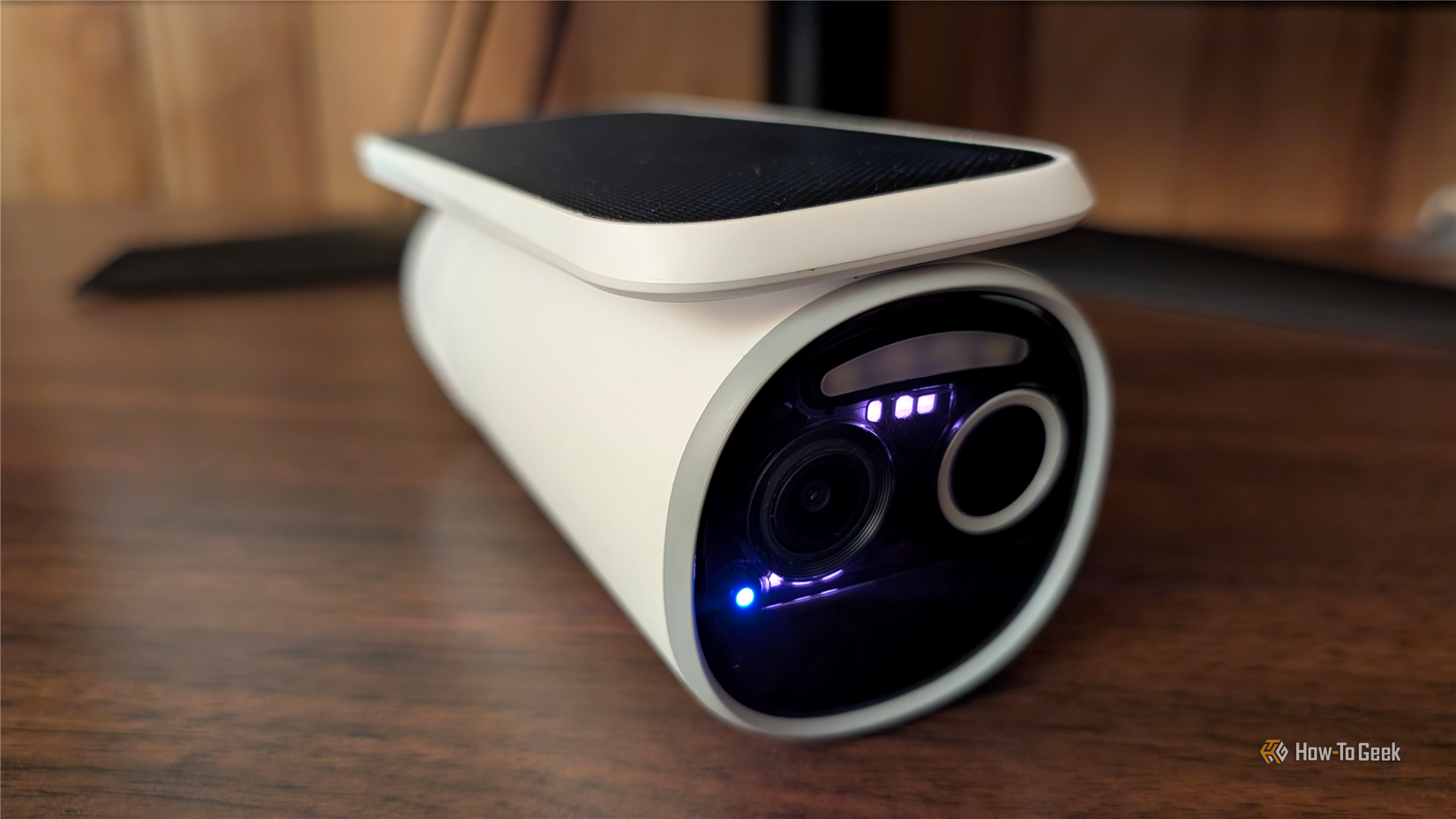 The Baseus S2 Camera on a desk with the IR lights enabled.