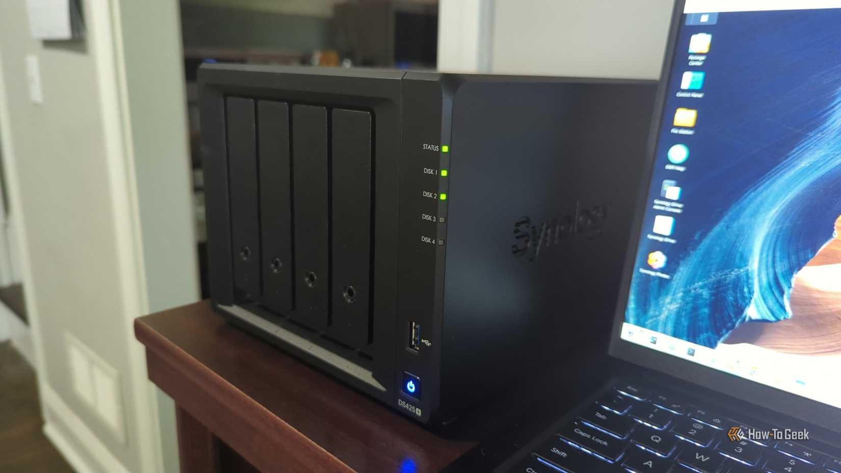 Synology DS425+ NAS next to your laptop.-2
