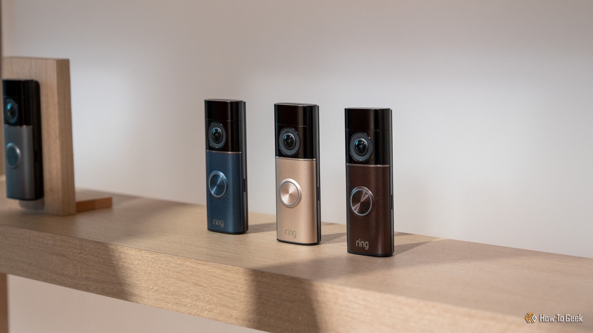 amazon wired doorbell pro in multiple colors sitting on a shelf