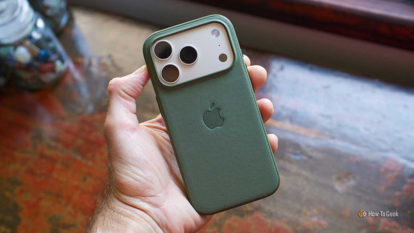 Apple iPhone 17 Pro TechWoven case with MagSafe rear in hand.