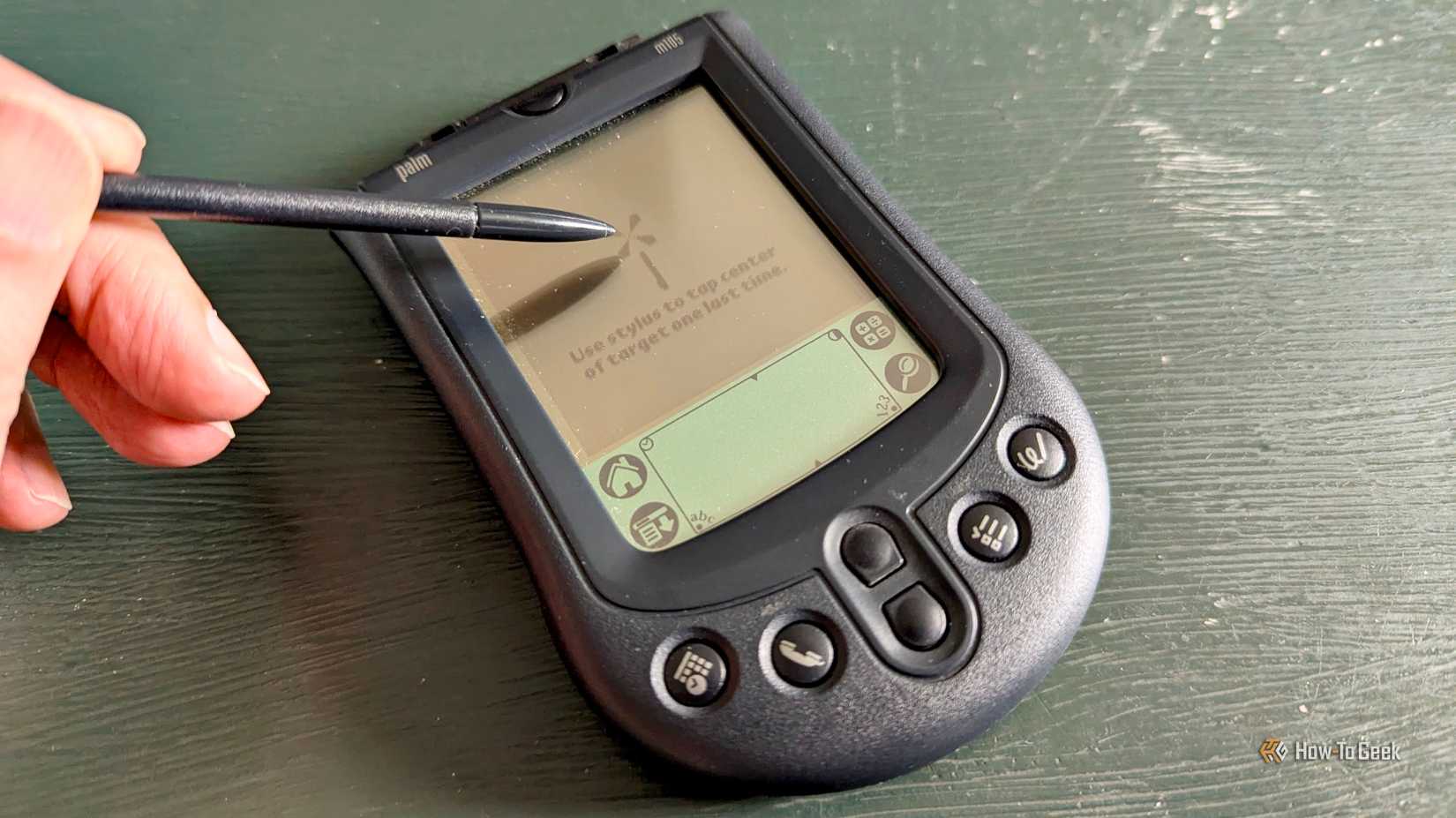 Callibrating the screen on a palm device.
