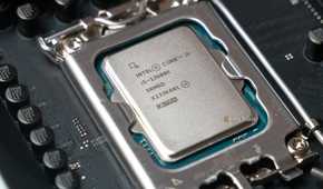 The Intel i5-13600K processor seated on a motherboard.