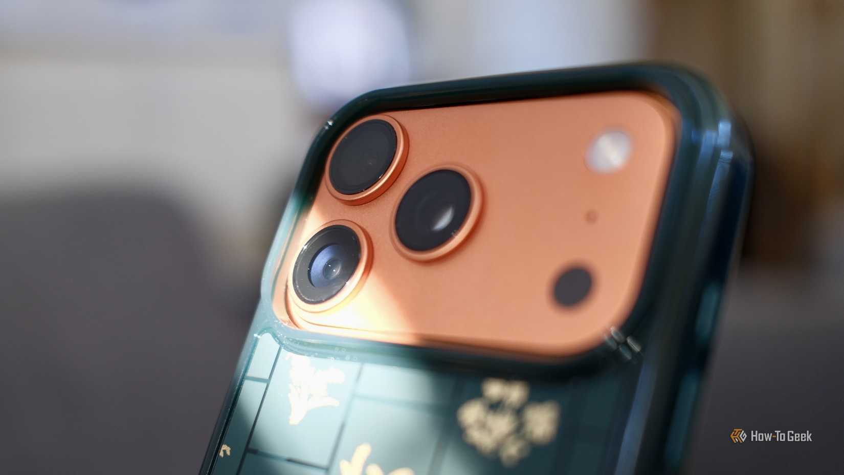 Apple iPhone 17 Pro with light shining on the camera lenses