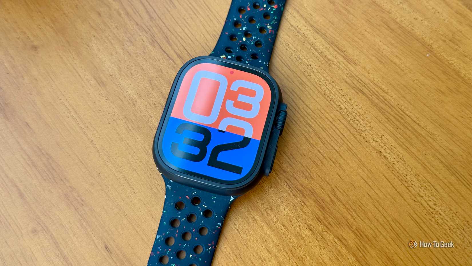 Apple Watch Ultra 3 lying on a table.