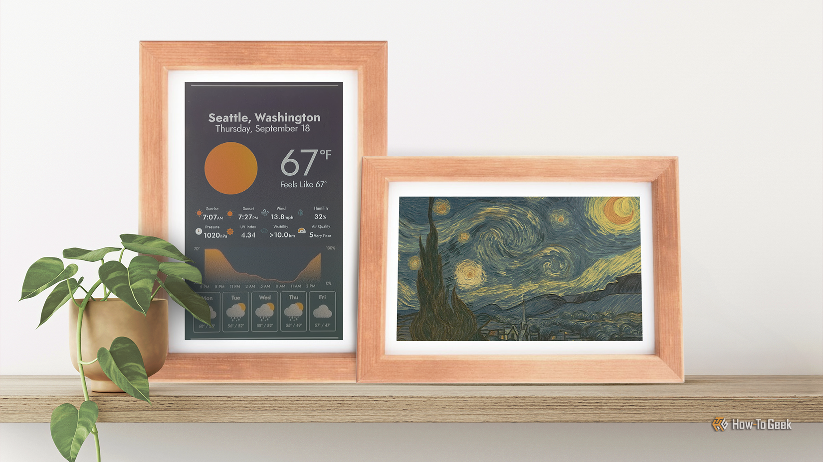Two framed e-ink displays on a shelf, one showing a weather dashboard and the other displaying a painting.