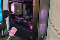 A clean gaming PC with its left panel opened.