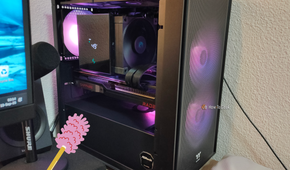 A clean gaming PC with its left panel opened.