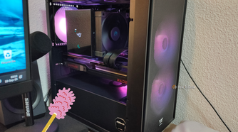 A clean gaming PC with its left panel opened.