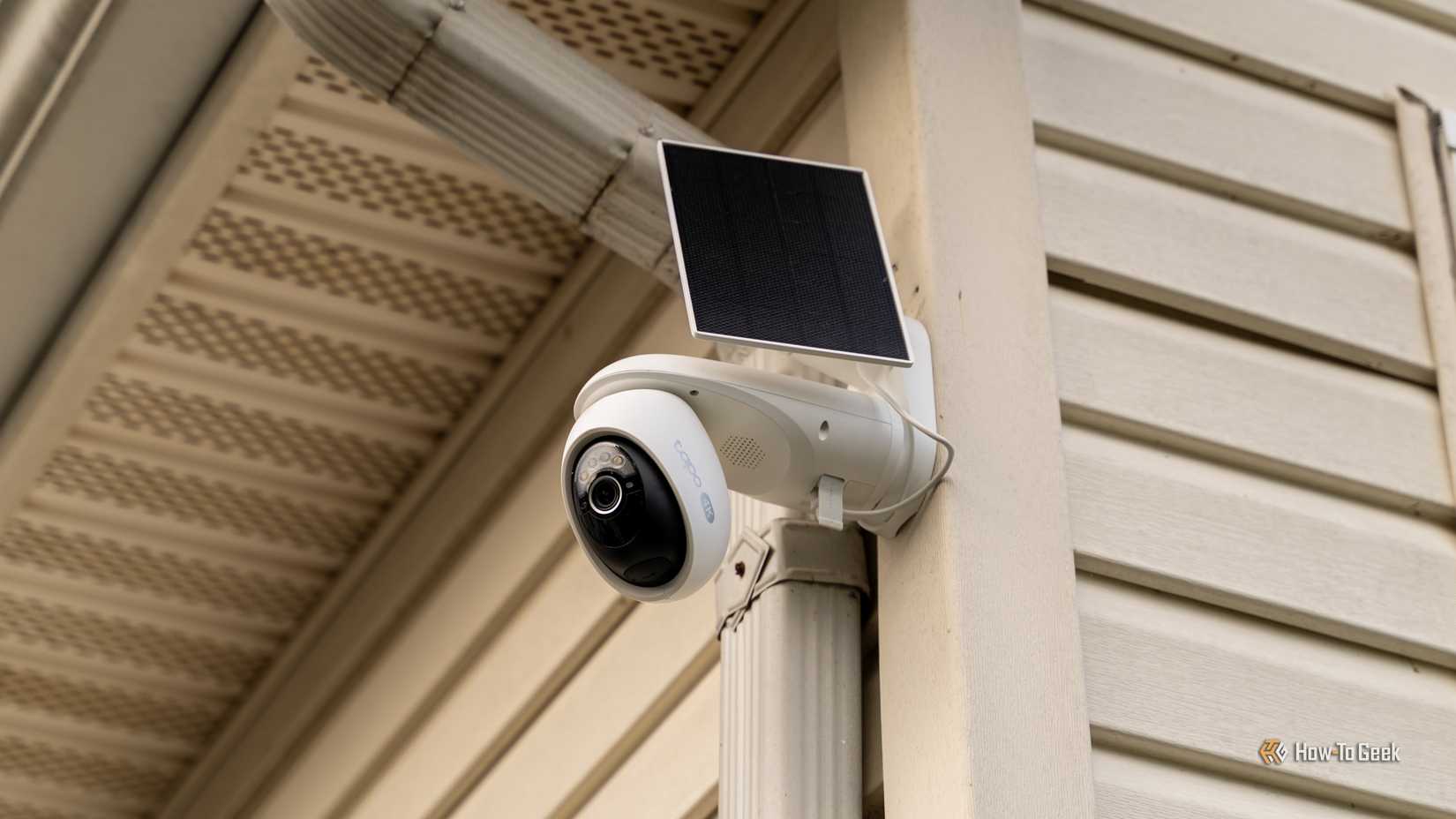 The side of the TP-Link Tapo C660 kit showing the solar panel mounted on a house.