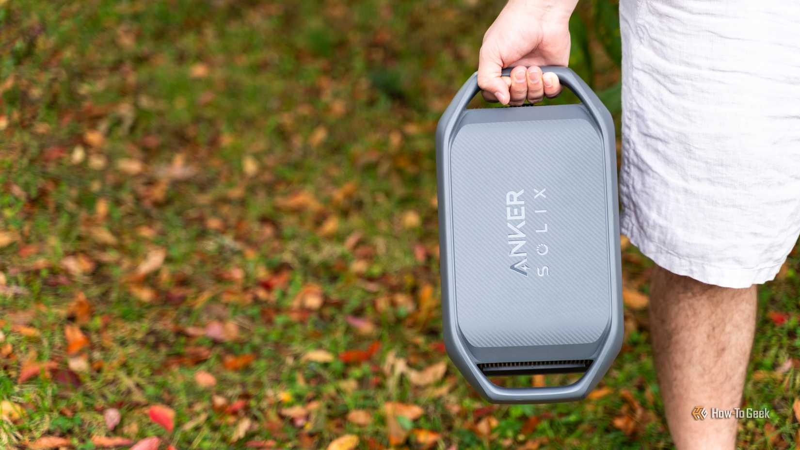 The top o the Anker SOLIX C1000 Gen 2 portable power station being held in a hand.