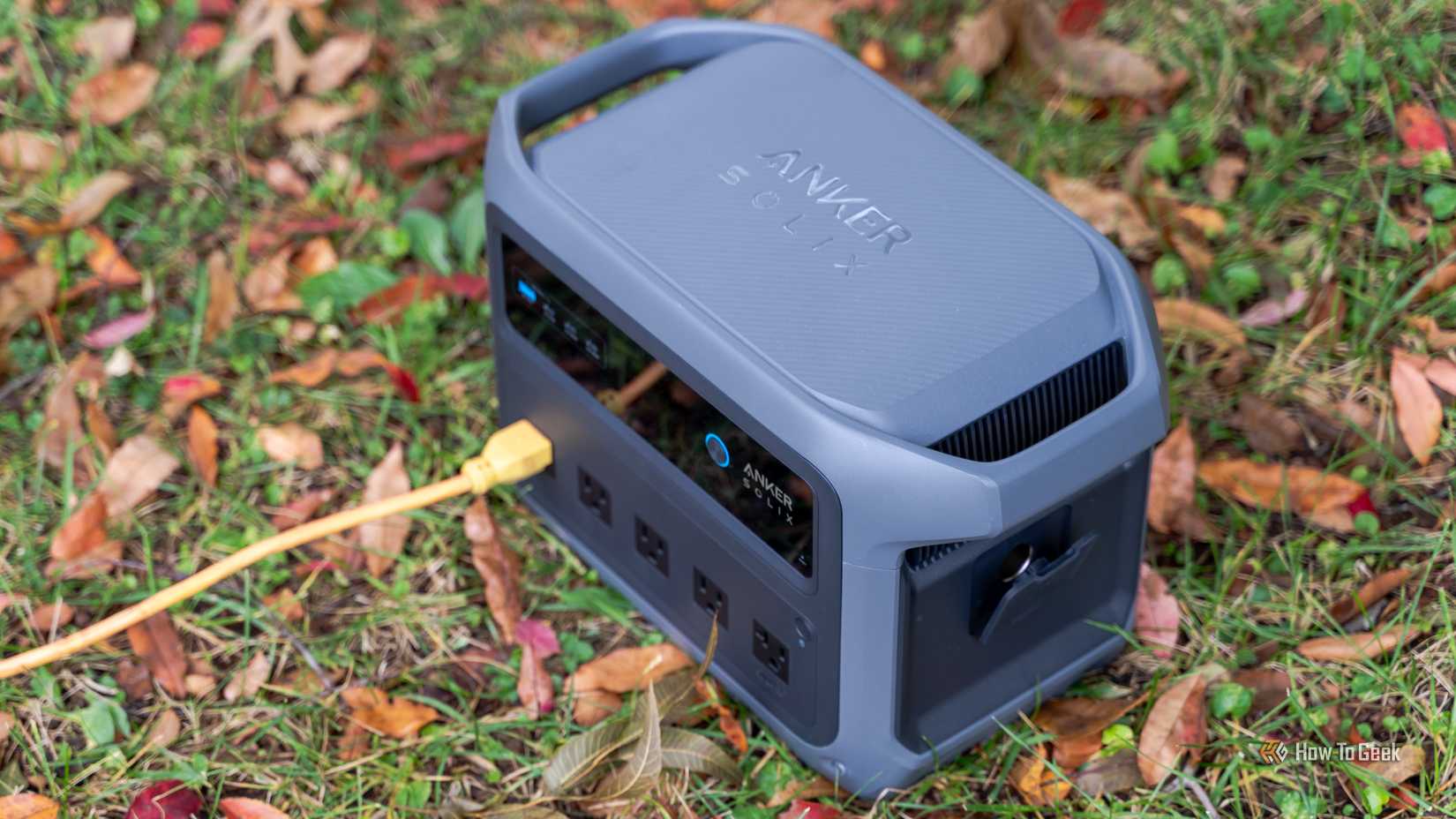 A top down view of the Anker SOLIX C1000 Gen 2 power station with an extension cord plugged in.