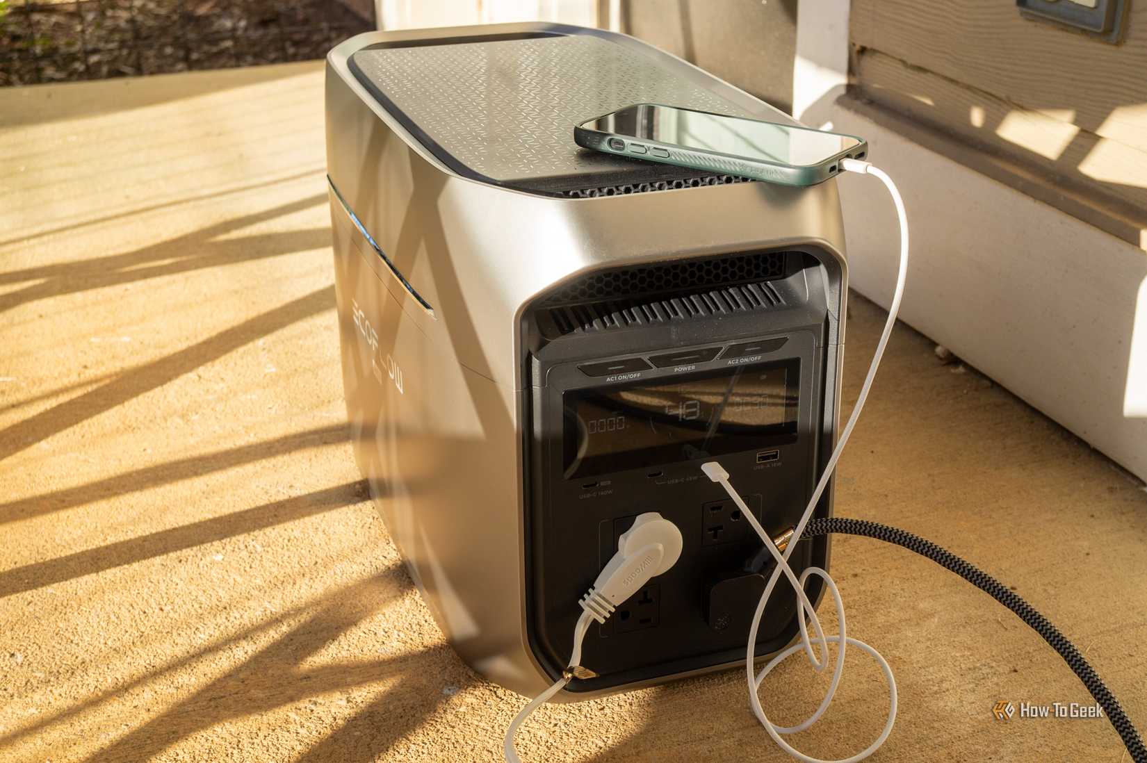 Power station with a phone and power cables connected