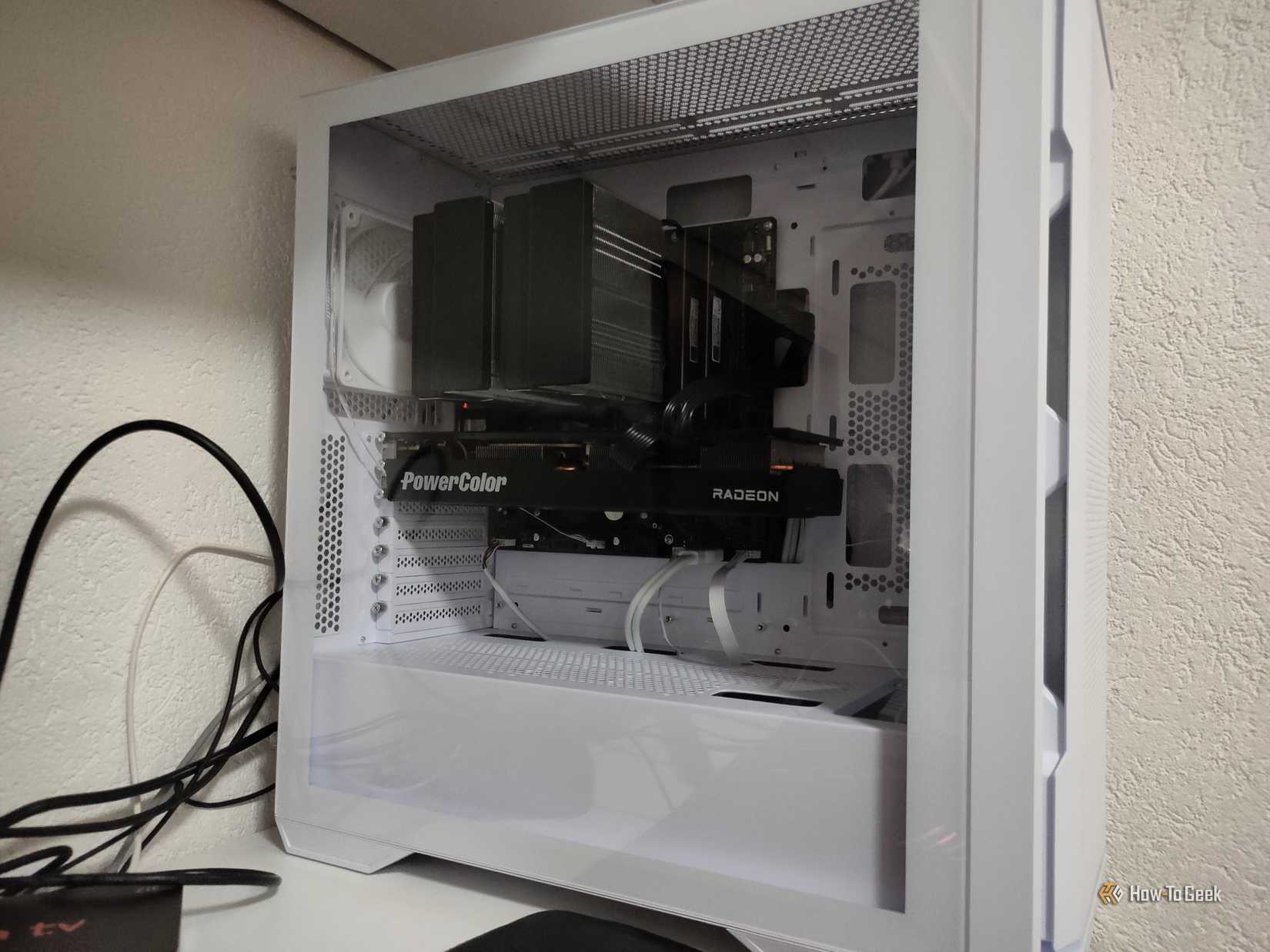 A white full-tower desktop gaming PC with a mATX case, large air cooler, and RX 6800.
