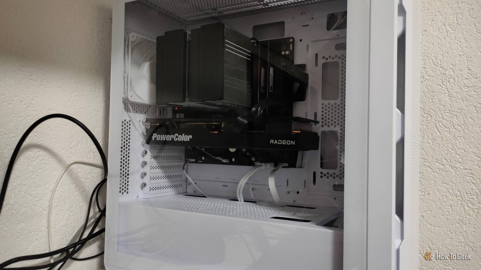A white full-tower desktop gaming PC with a mATX case, large air cooler, and RX 6800.