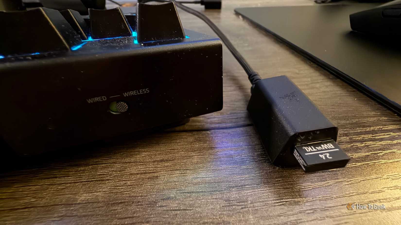 The wireless mode switch and wireless dongle of the Razer BlackWidow V4 Tenkeyless HyperSpeed.