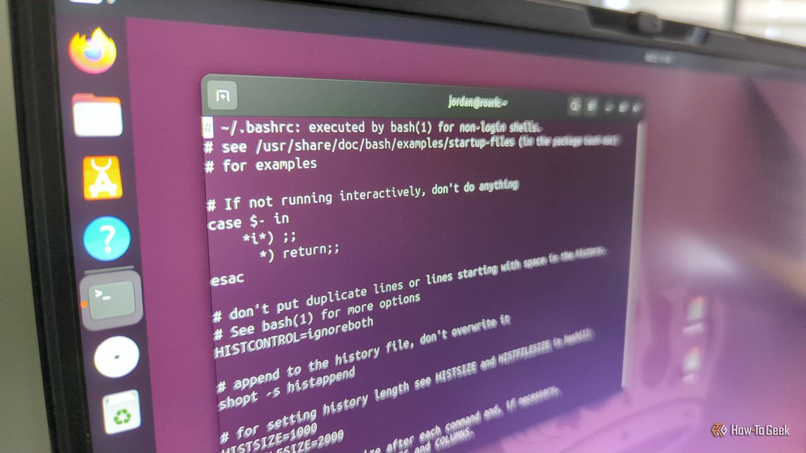 A Linux terminal open in Ubuntu with the vim editor editing the .bashrc file.