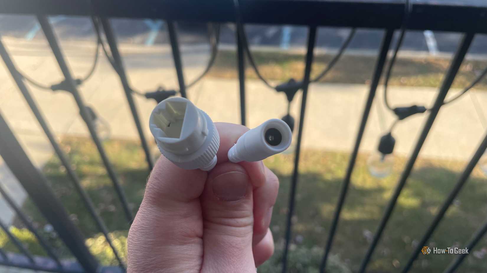 The Ethernet and power connections for the Tapo C560WS.