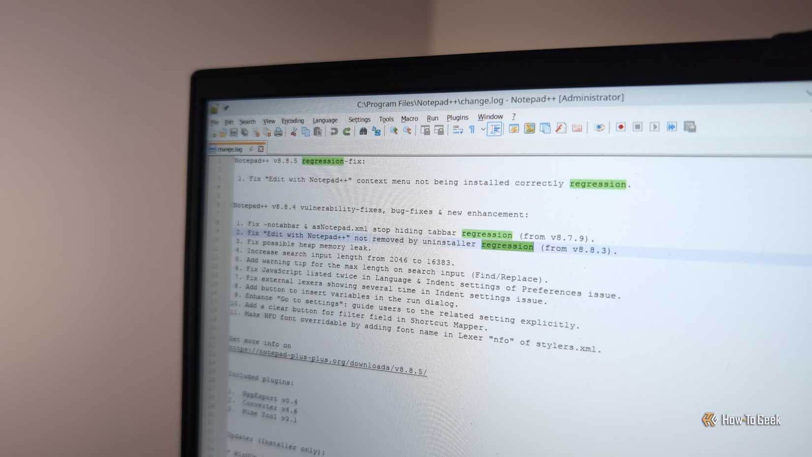 Notepad++ opens on the computer screen with the change file open.