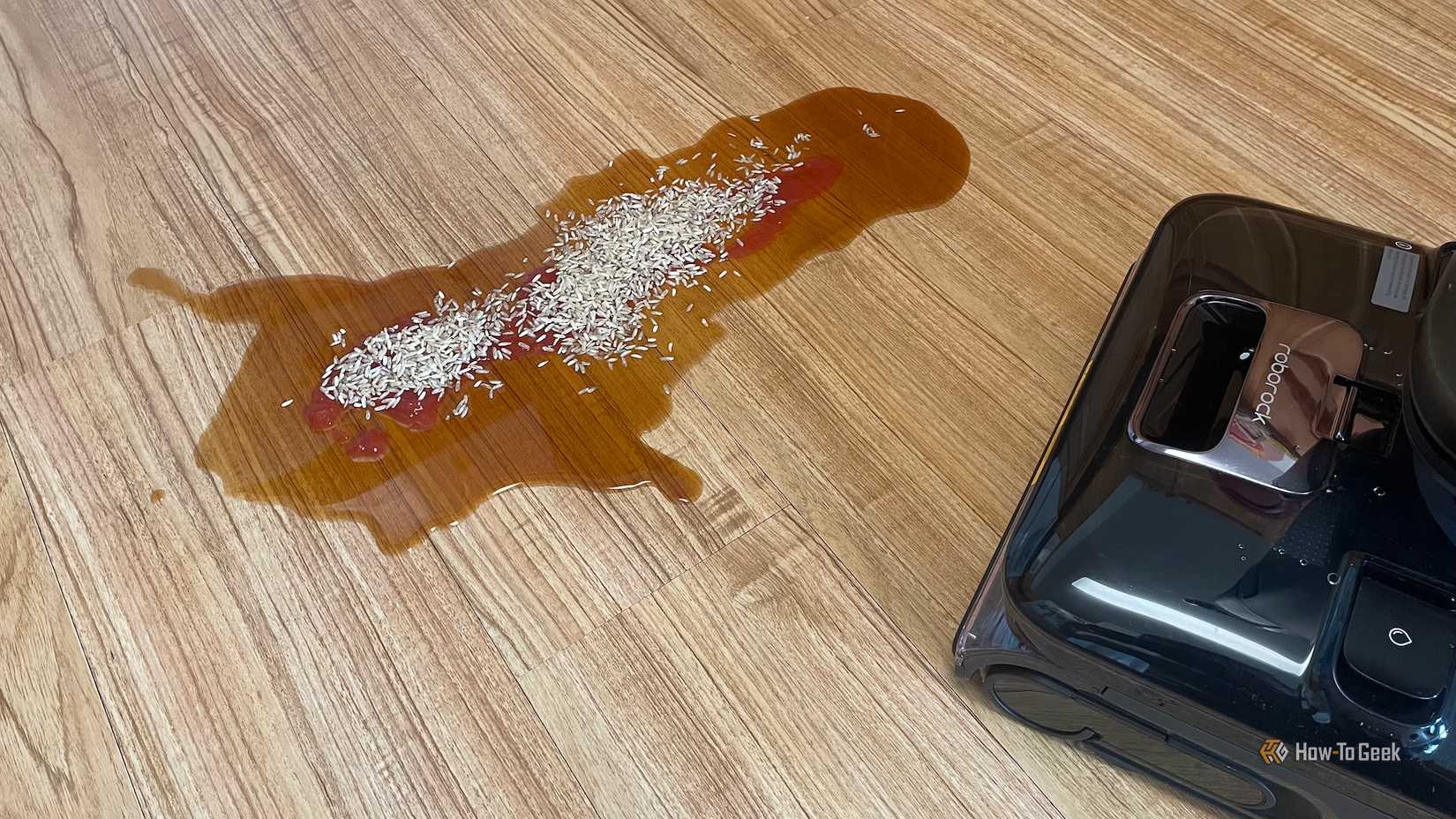Coffee, rice, and ketchup stain set up for the Roborock F25 Ultra to clean.