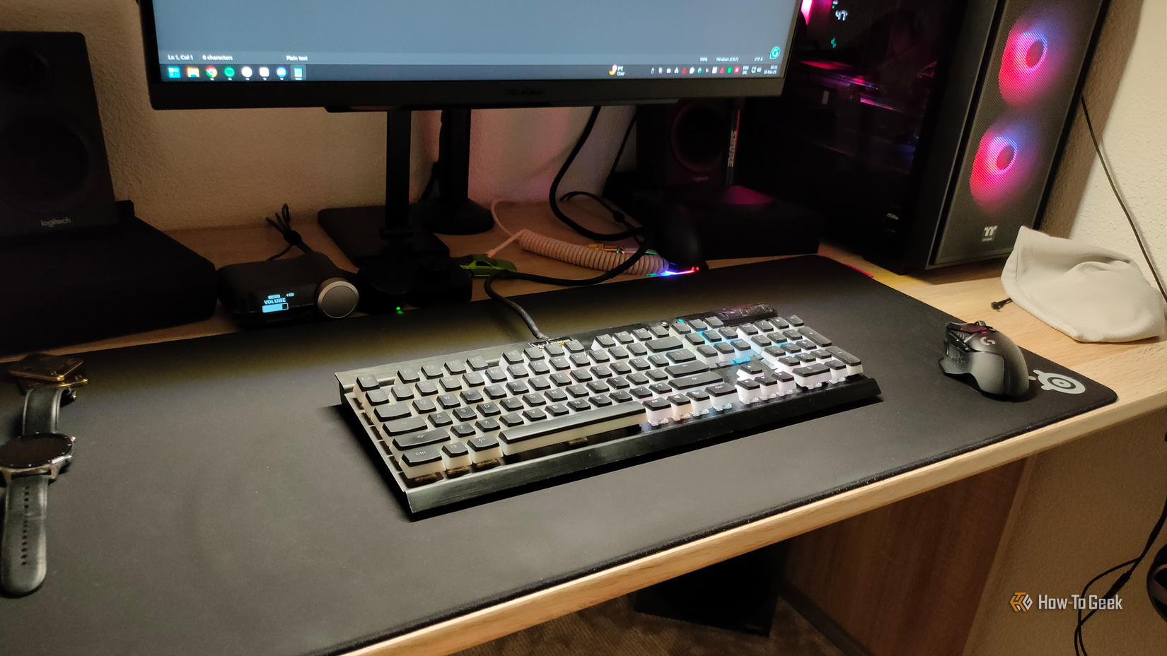 The old Corsair K70 mechanical keyboard on a desk.