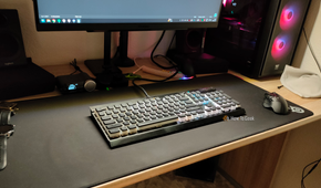 The old Corsair K70 mechanical keyboard on a desk.