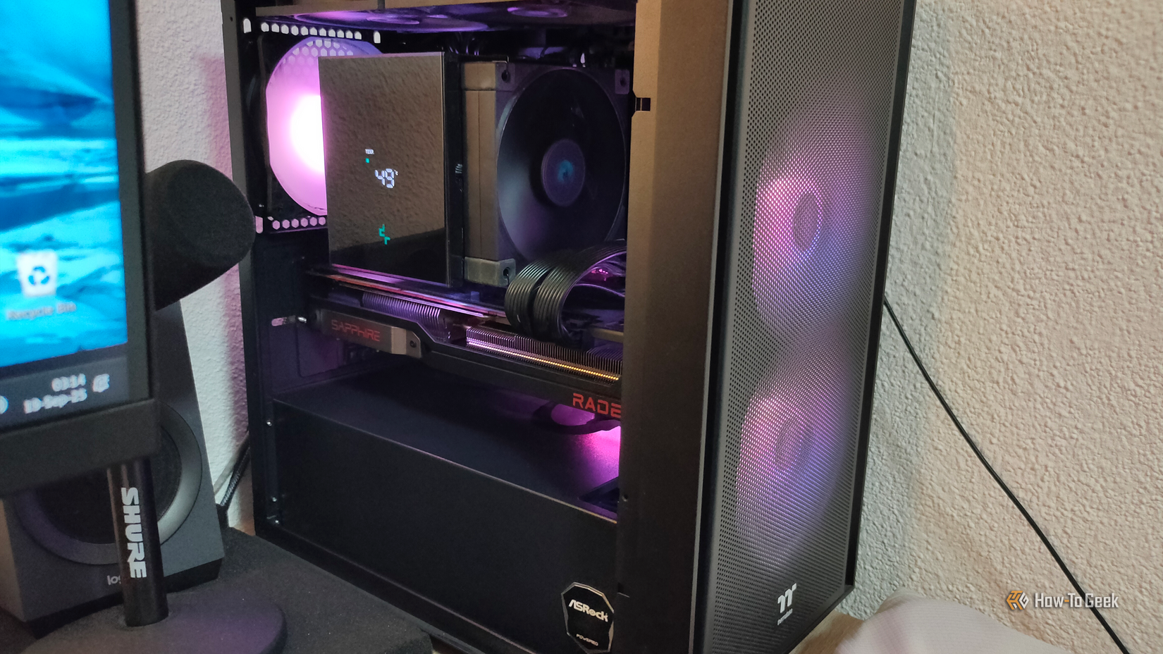 A gaming PC with the left side panel removed.