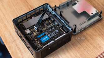 The Geekom IT15 opened to reveal its motherboard.