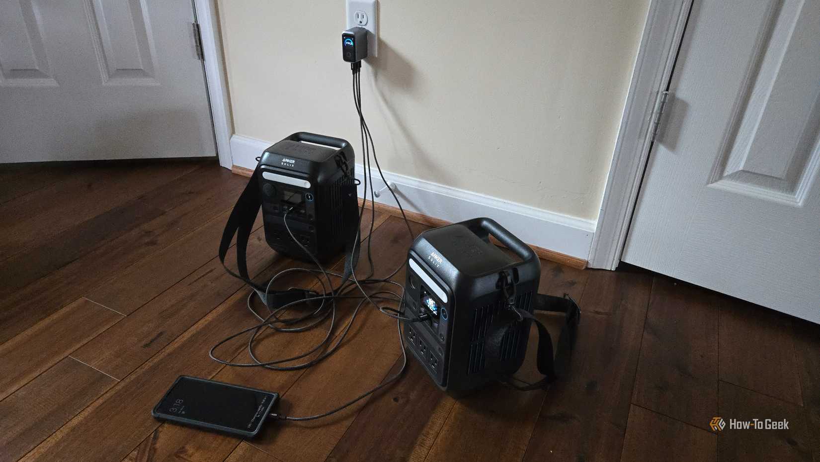 Two Anker SOLIX C300 and a Moto Edge+ 2023 plugged