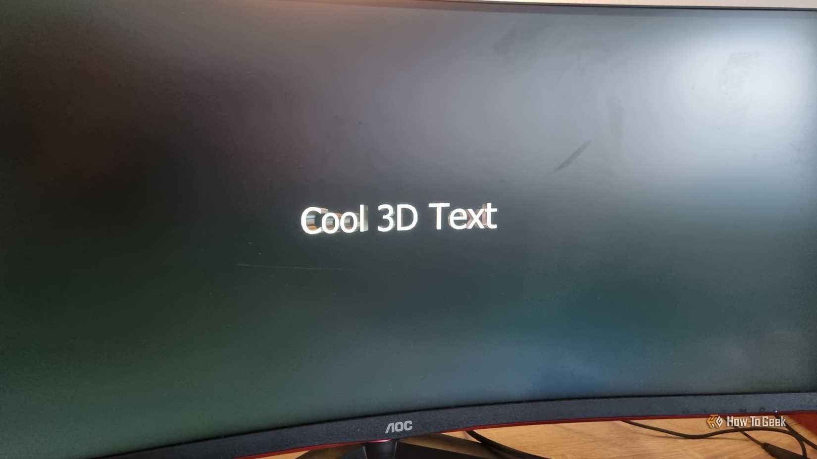 The 3d text screensaver running on an ultrawide monitor. 