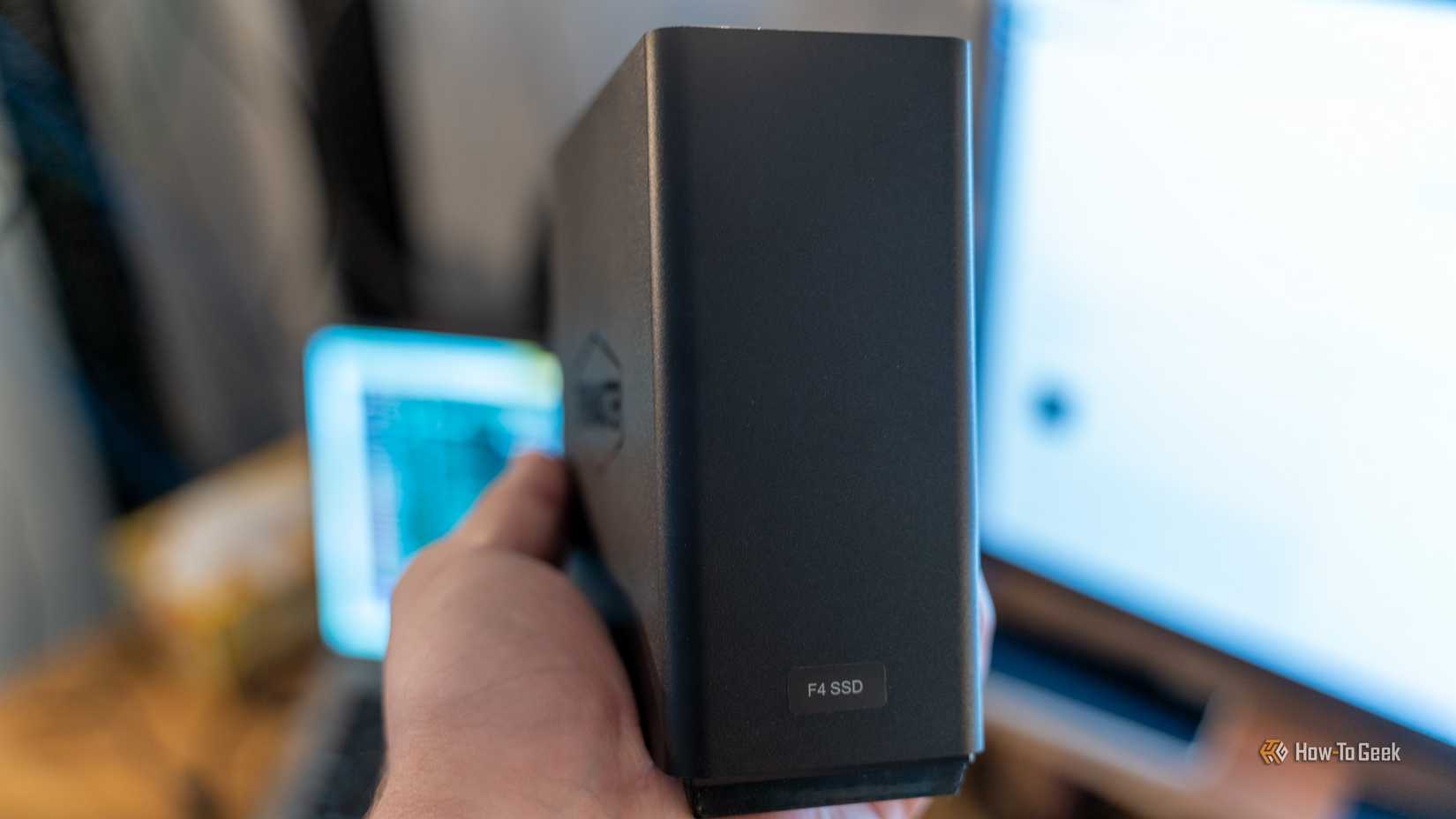 A person holding the TerraMaster F4 SSD NAS.