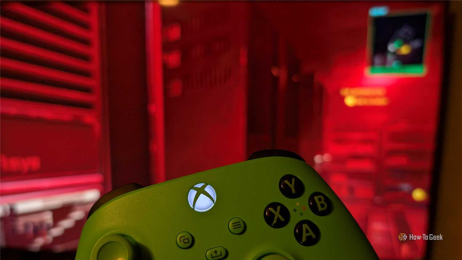 6 настроек вашего роутера, которые стоит отключить для безопасности An Xbox controller in front of Cyberpunk 2077.
