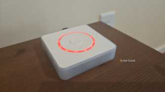 Home Assistant Voice Preview Edition with a red error light.