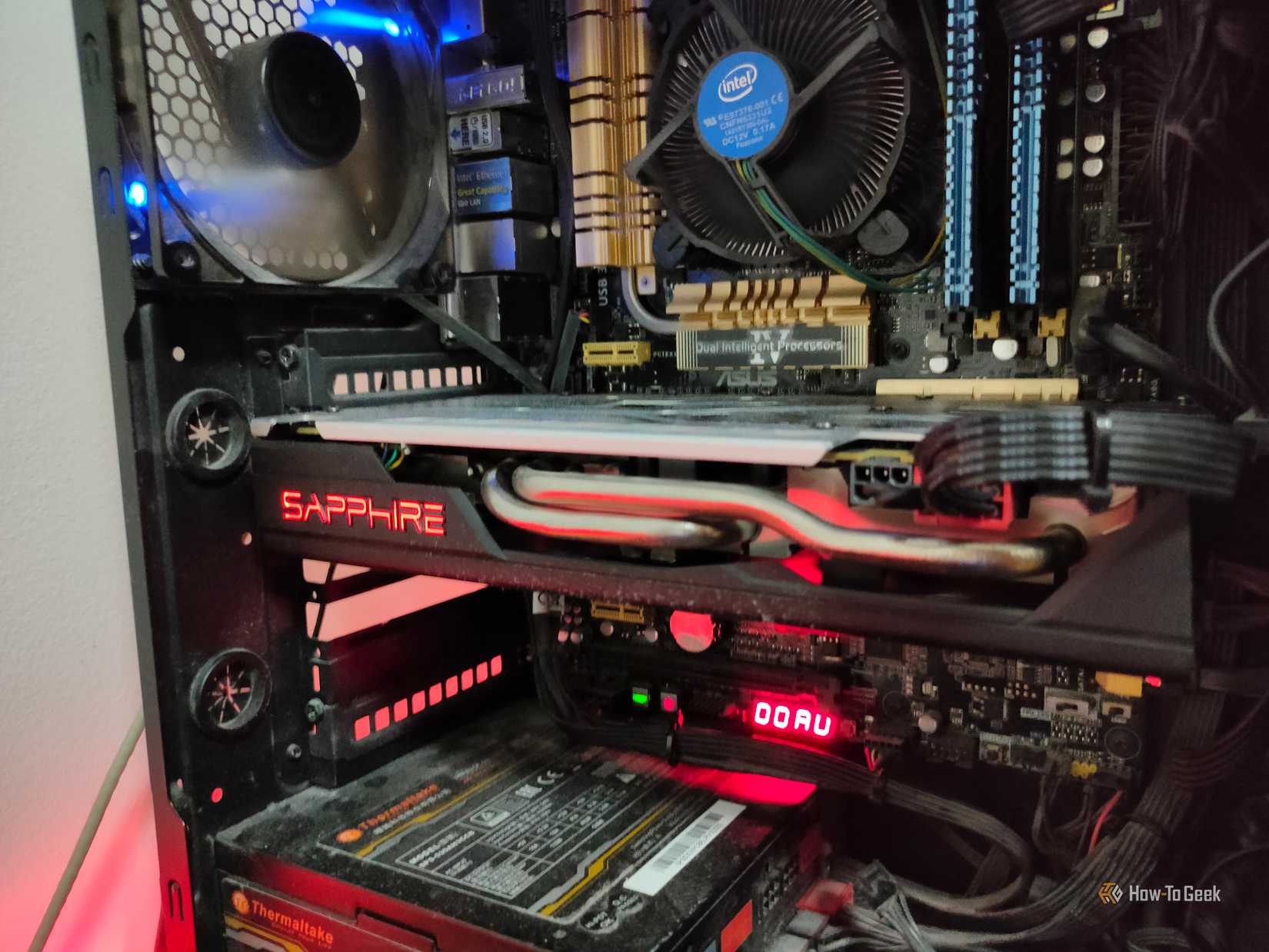 An old AMD RX 580 inside of a dusty old gaming pc.
