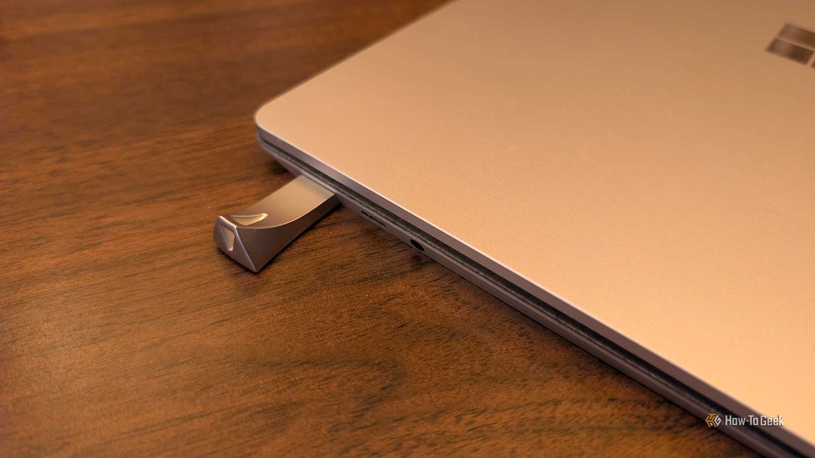 A USB drive in a Microsoft Surface laptop. 