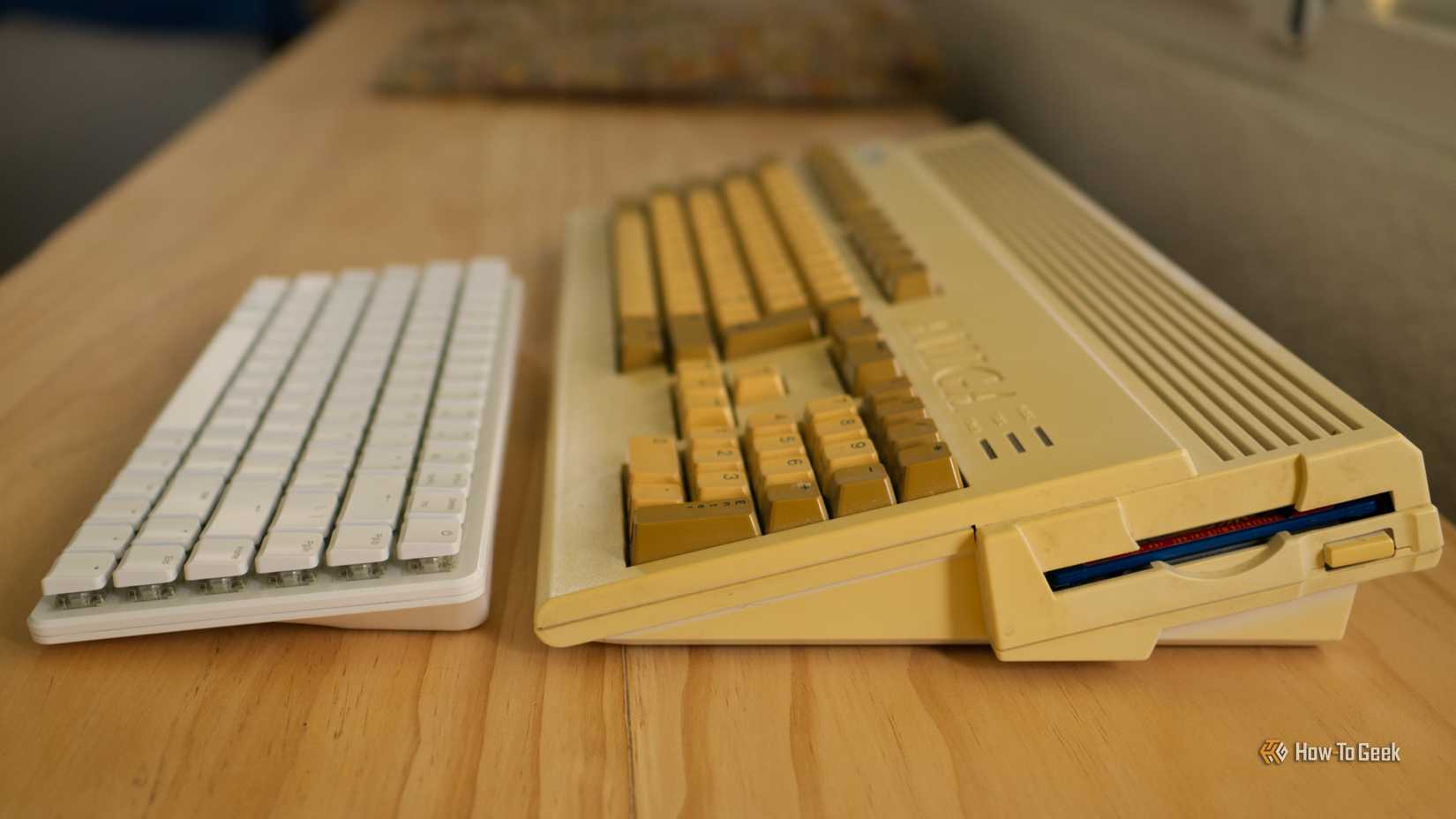 Raspberry Pi 500 and an Amiga A1200 side by side.