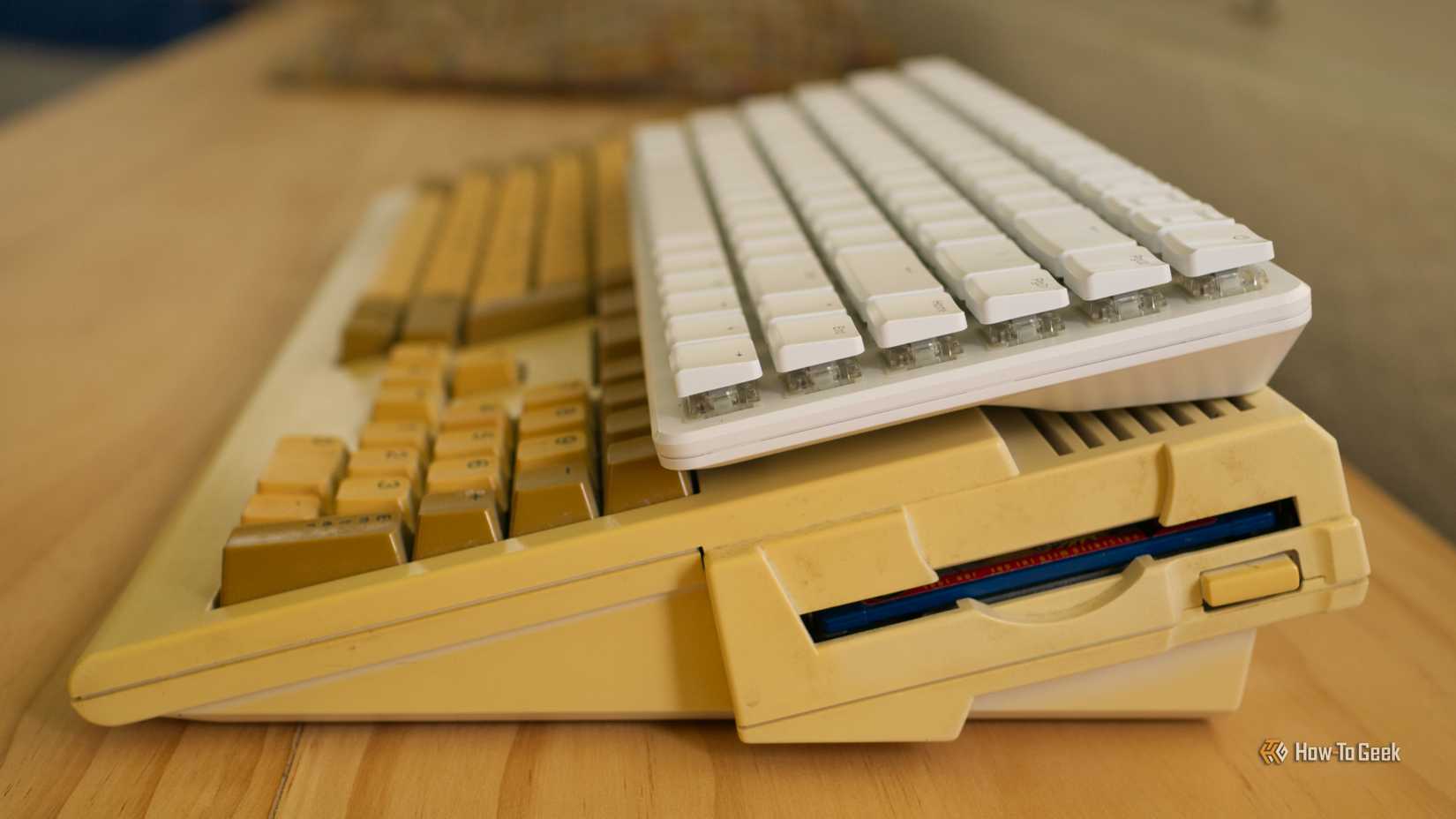 Raspberry Pi 500+ on top of an Amiga A1200 side-on