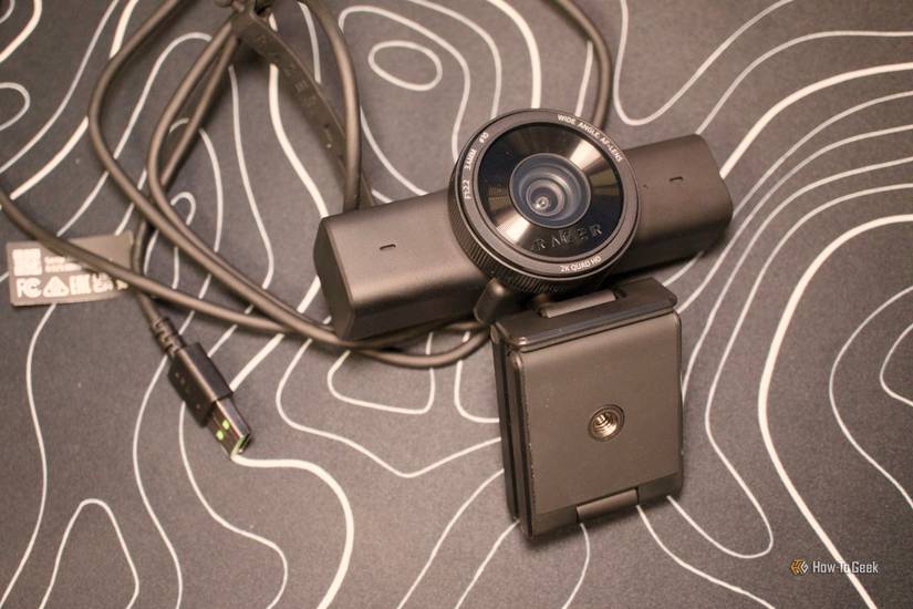 Razer Kiyo V2 X webcam on a desk with the USB cable