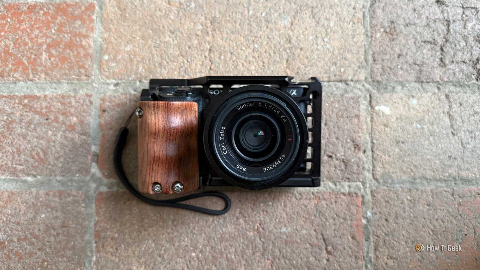 Sony A6500 mirrorless camera with a SmallRig cage.
