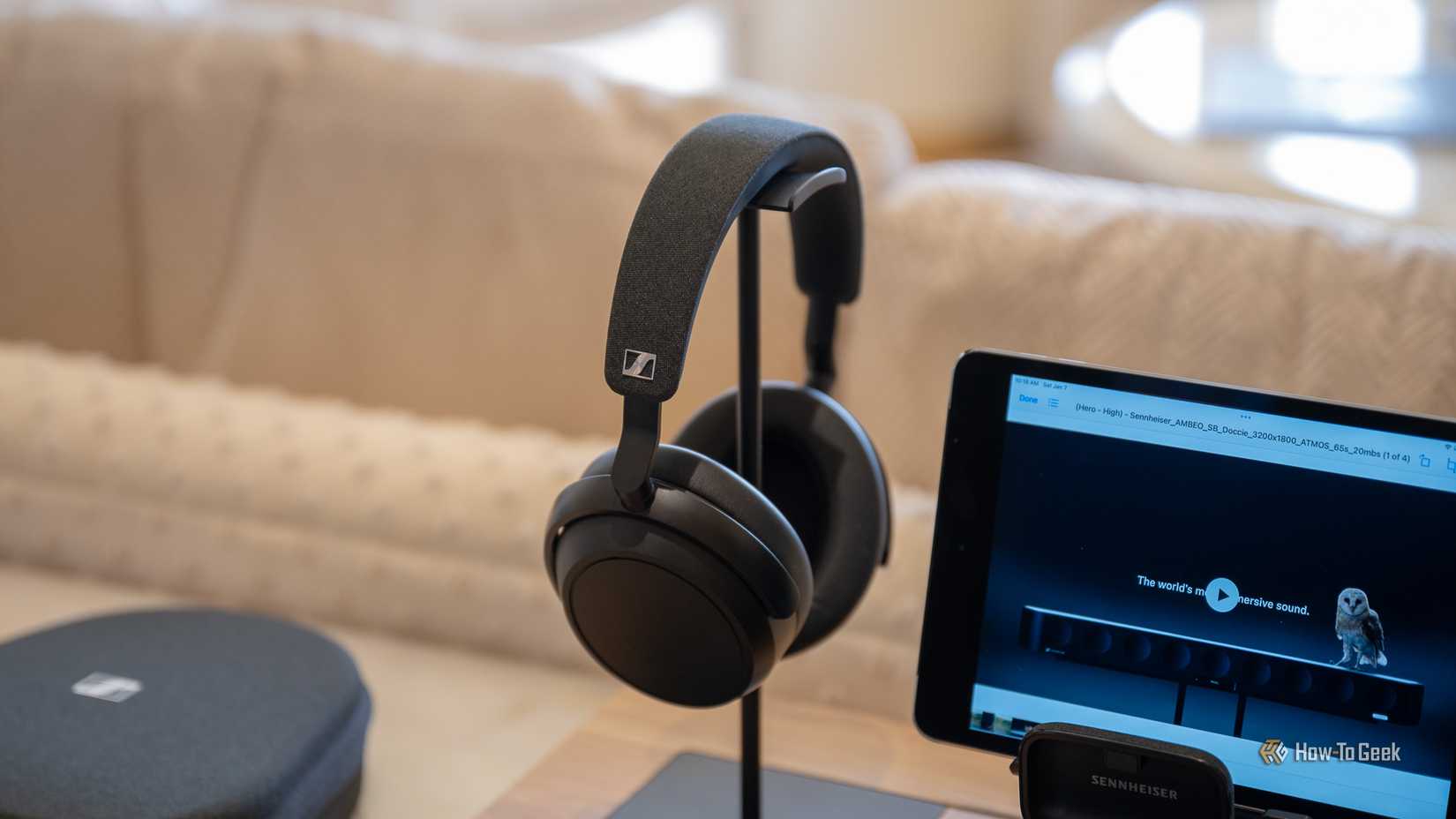 Sennheiser Momentum 4 Wireless headphone placed on a stand.