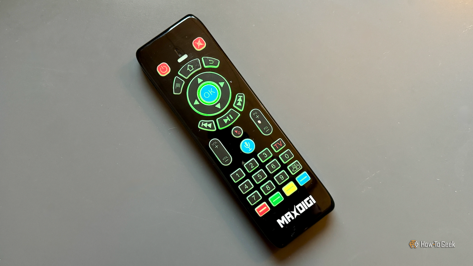 A Maxdigi Wi-Fi remote mouse and keyboard lying on a table.