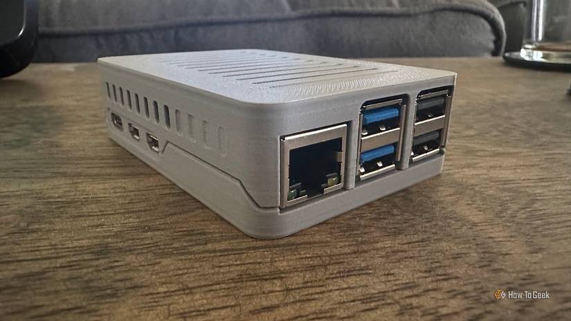 A Raspberry Pi 5 in a 3D pritned case compatible with active coolers.