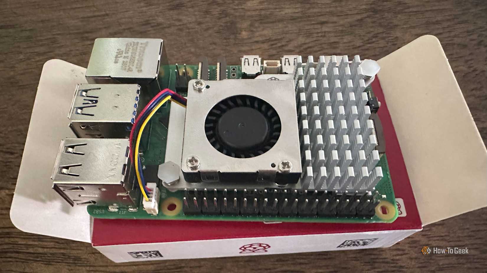 A Raspberry Pi with its official cooler fitted.