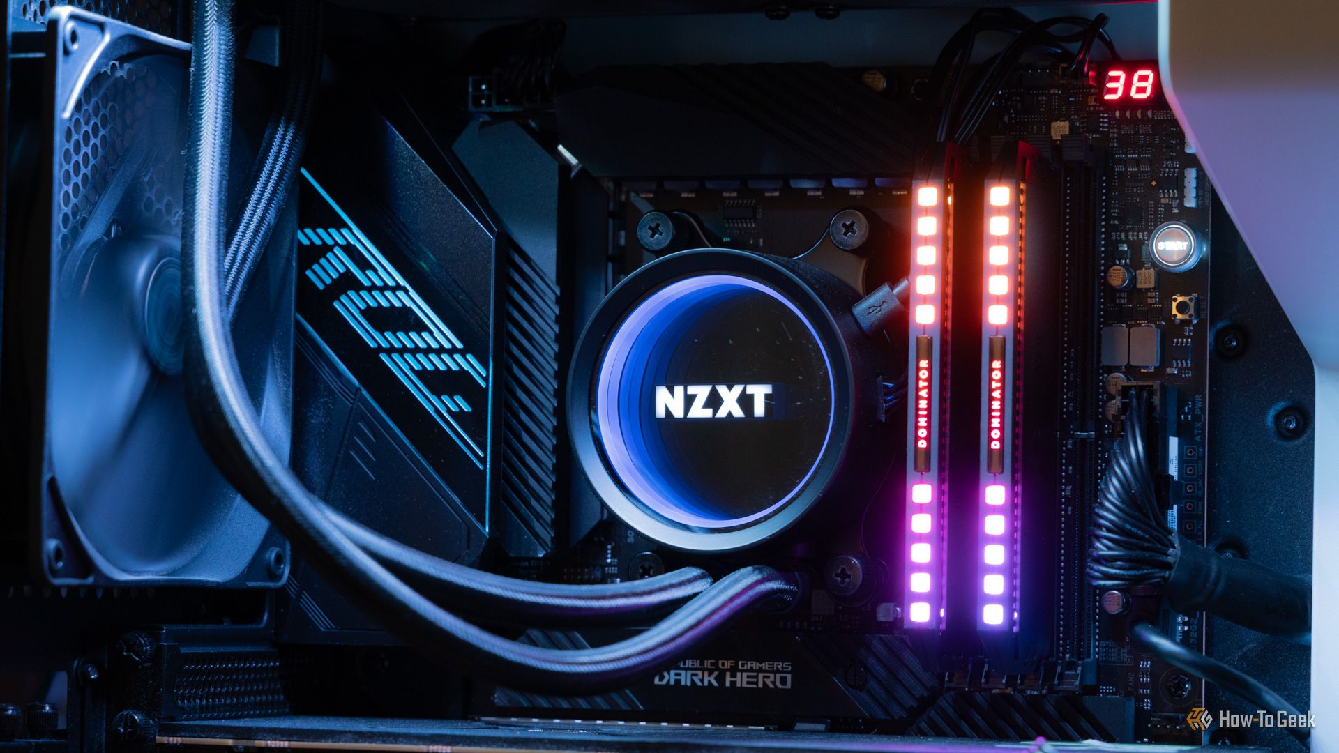 An NZXT water cooler in a gaming desktop with CORSAIR DOMINATOR RAM and an ASUS ROG motherboard.