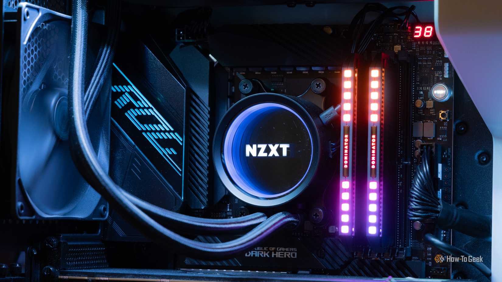 An NZXT water cooler in a gaming desktop with CORSAIR DOMINATOR RAM and an ASUS ROG motherboard.