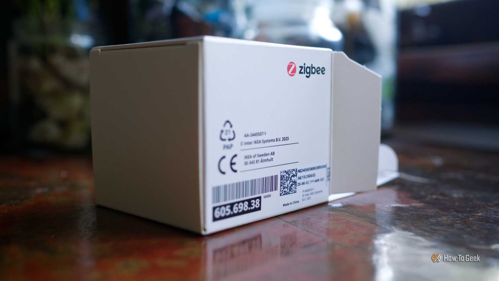 IKEA Zigbee smart plug packaging on its side.