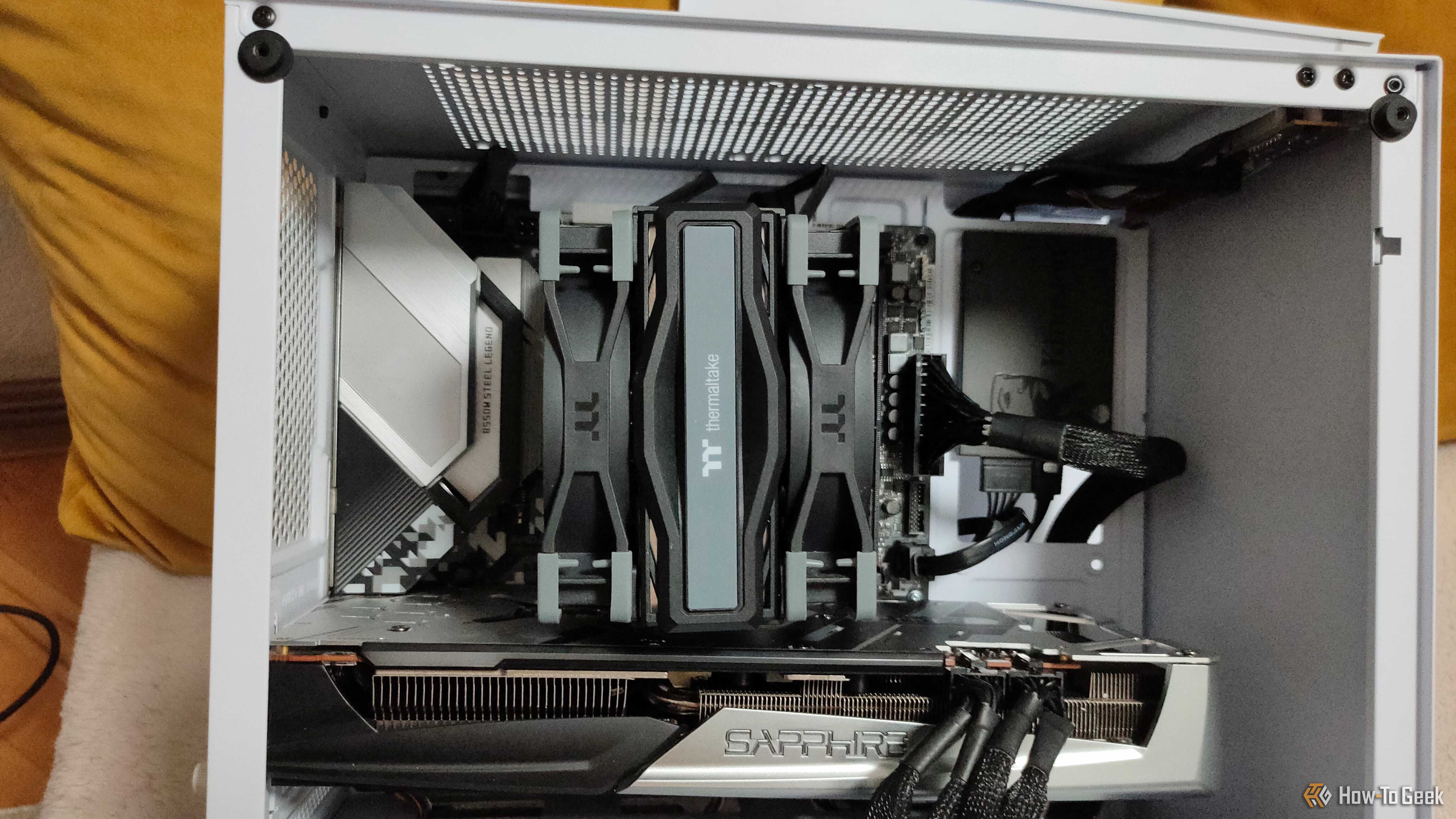 A white gaing PC with an AIo cooler and no case fans.