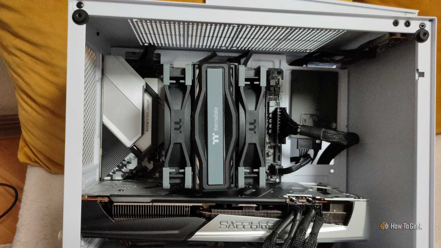A white gaing PC with an AIo cooler and no case fans.