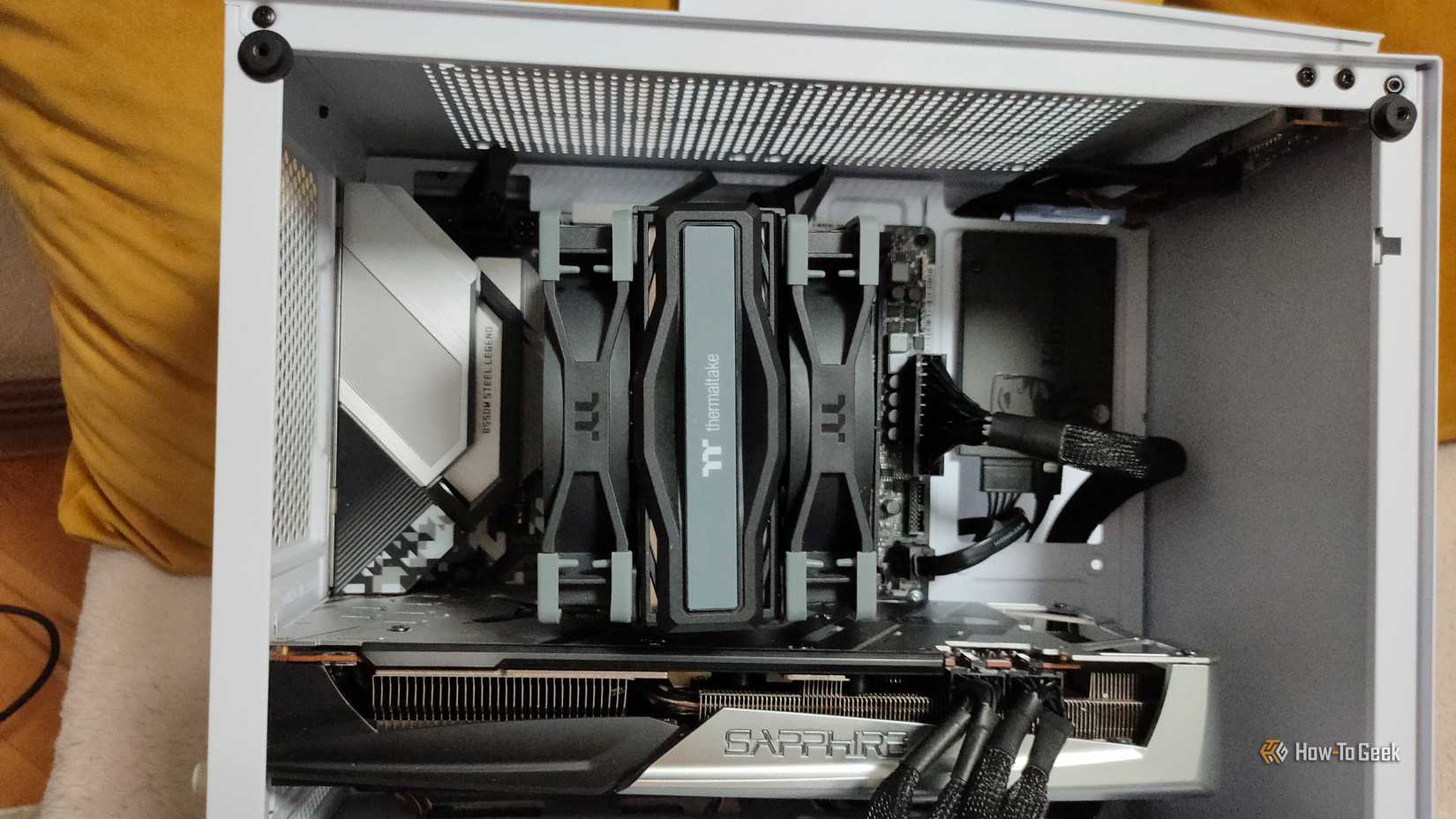 A white gaing PC with an AIo cooler and no case fans.