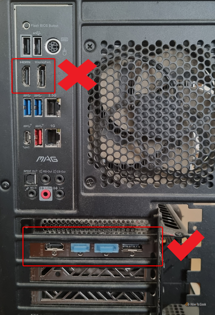 The rear I/O panel on the motherboard with the video card video inputs underneath it. 